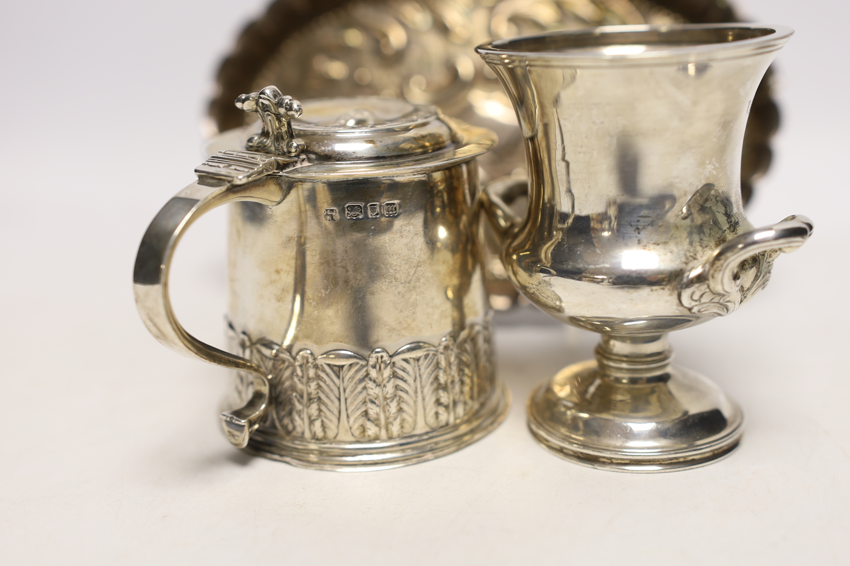 A George V miniature tankard with engraved inscription to commemorate the 'Merchant Taylors Co, 1st Charter, 1327', Daniel & John Welby, London, 1927, 85mm, together with a William IV silver small campana shaped vase and